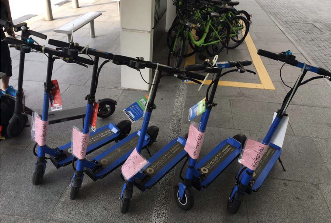 Telepod e-scooters impounded at a bus stop along Bayfront Avenue on 14 July 2018. Photo from LTA