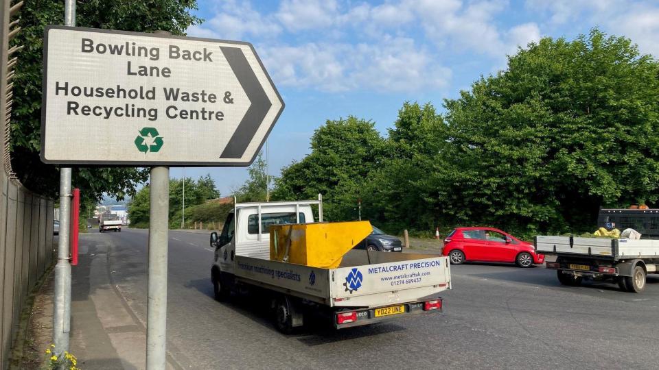 Trucks outside Bowling Back Lane Household Waste Recycling Centre