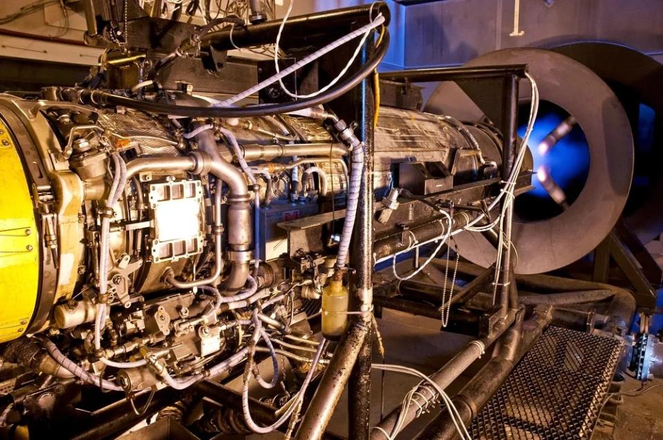 DynCorp International jet mechanics check the functionality of a J85-5 engine from a T-38 aircraft on Dec. 4, 2013, at Sheppard Air Force Base, Texas. All aircraft engines are required to have a performance check before they are installed into an aircraft. (Frank Carter/Air Force)