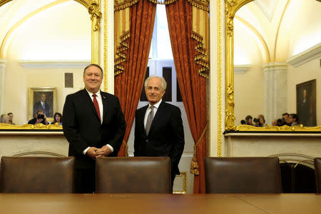 U.S. Senate Foreign Relations Committee Chairman Bob Corker (R-TN), R, meets with CIA Director Mike Pompeo, L, President Trump's nominee for Secretary of State, at the U.S. Capitol in Washington March 19, 2018. REUTERS/James Lawler Duggan