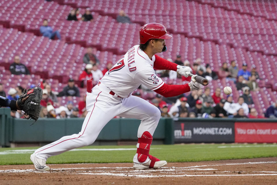 Cincinnati Reds' Stuart Fairchild lays down a bunt during the first inning of a baseball game against the Tampa Bay Rays, Monday, April 17, 2023, in Cincinnati. (AP Photo/Joshua A. Bickel)