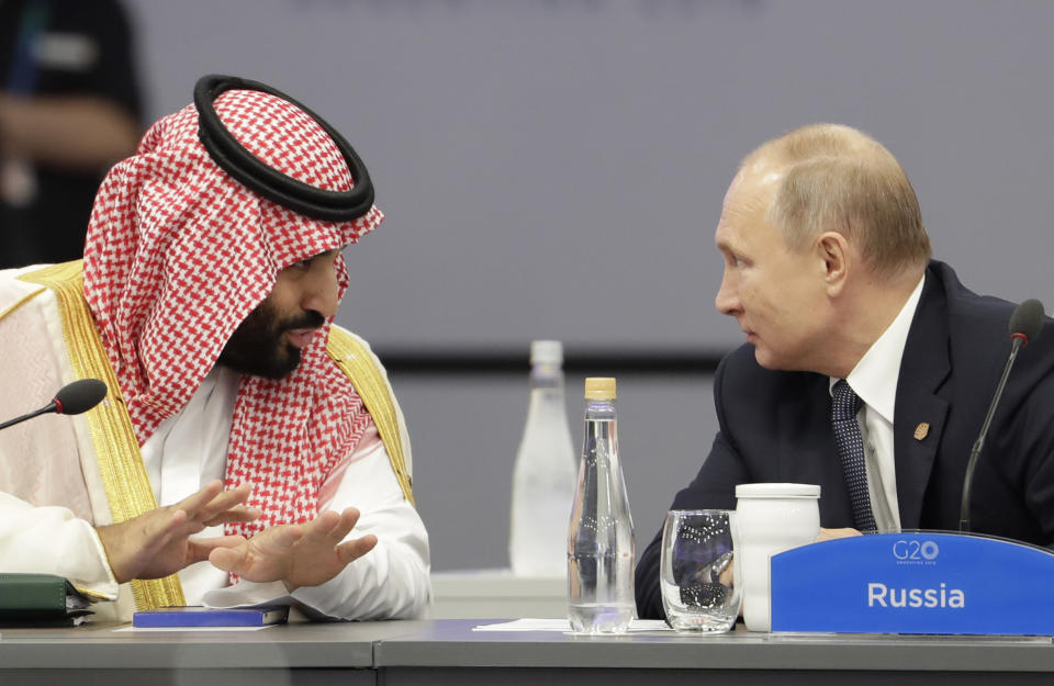 Saudi Arabia’s Crown Prince Mohammed bin Salman, left, and Russia’s President Vladimir Putin speak at the start of the G-20 summit in Buenos Aires, Argentina, Friday, Nov. 30, 2018. (Photo: Natacha Pisarenko/AP)