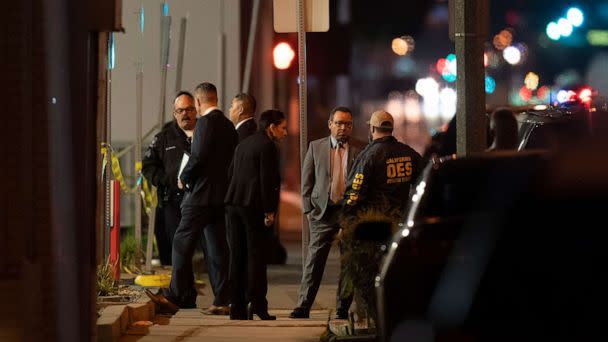 PHOTO: Investigators gather at a scene where a shooting took place in Monterey Park, Calif., Sunday, Jan. 22, 2023. (Jae C. Hong/AP)