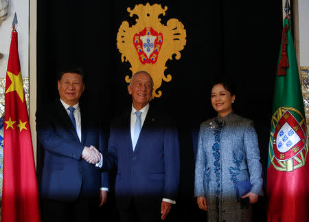 China's President Xi Jinping and his wife Peng Liyuan meet with Portuguese President Marcelo Rebelo de Sousa at Belem Presidential palace in Lisbon, Portugal, December 4, 2018. REUTERS/Pedro Nunes