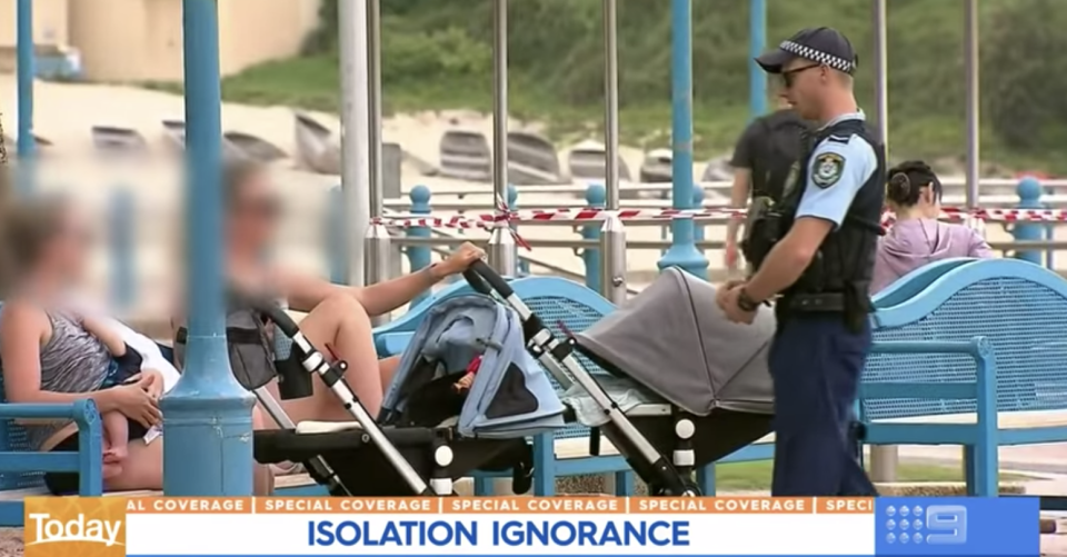 The mum and her friend are seen talking to the police officer. Source: Channel Nine