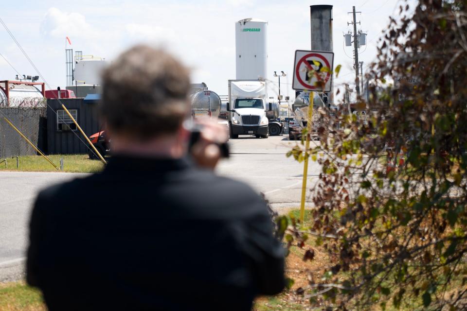 Tim Doty uses an infrared camera to observe emissions from K-Solv's Jacintoport facility.