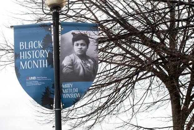 Twenty-eight banners have been affixed to light posts along Fredericton's Queen Street to celebrate New Brunswick's Black history, including one featuring Mary Matilda Winslow.