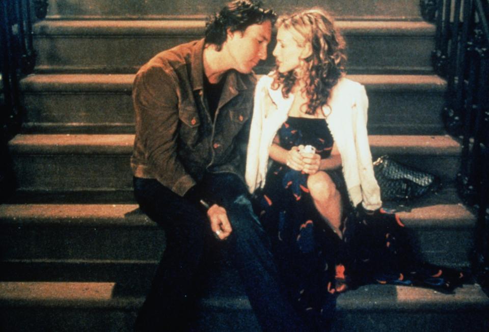 384168 07: Actors Sarah Jessica Parker (Carrie) and John Corbett (Aidan) act in a scene from the HBO television series 