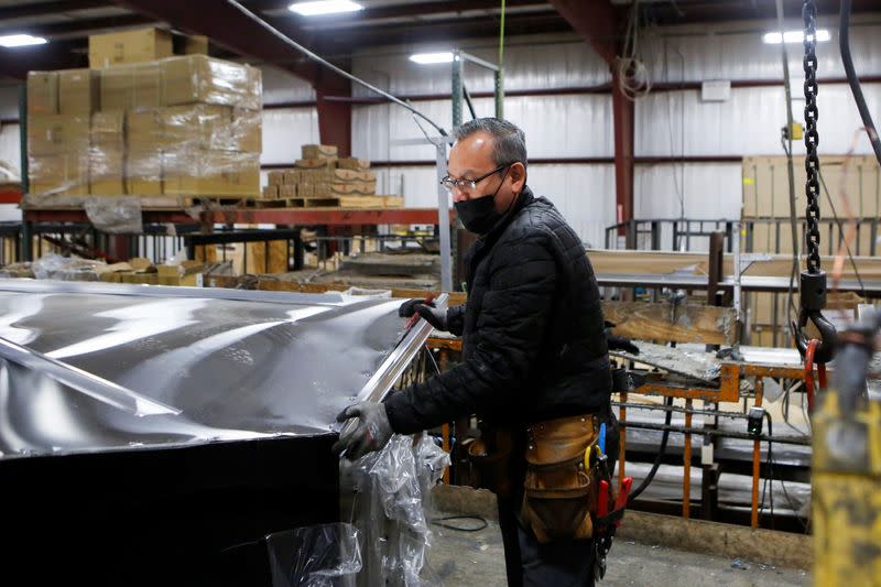 Matt Arnold, CEO of Look Trailers, tours the company's utility trailer manufacturing facility in Middlebury