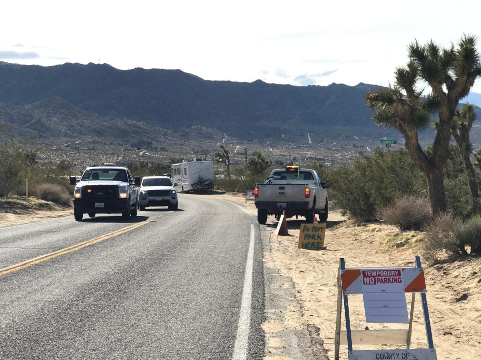 Rangers manage traffic at Joshua Tree National Park's West Entrance in a 2020 photo.