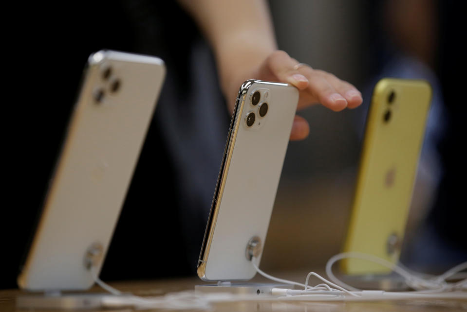 Apple's new (L-R) iPhone 11 Pro Max, 11 Pro and 11 are displayed after they went on sale at the Apple Store in Beijing, China , September 20, 2019. REUTERS/Jason Lee