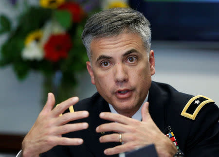 FILE PHOTO - Army Cyber Command Brigadier General Paul Nakasone talks during a Reuters CyberSecurity Summit in Washington May 12, 2014. REUTERS/Larry Downing/File Photo