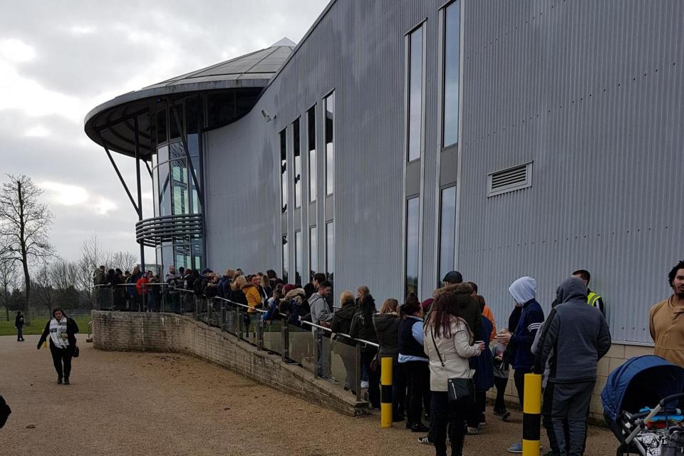 The queue for the refund queue snaked round the main building by 1.30pm (Sharon Lee)