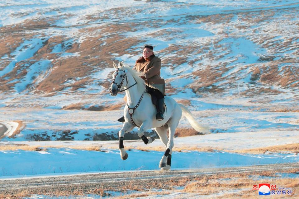 North Korean leader Kim Jong-un rides a white horse to climb Mount Paektu, North Korea in undated photo (AP)