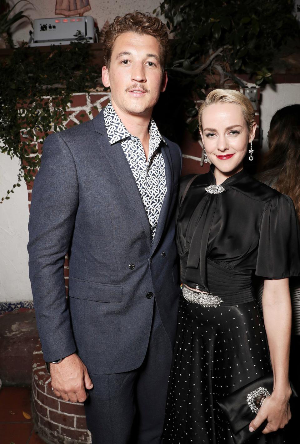 Miles Teller poses with costar Jena Malone at the <em>Too Old to Die Young</em> TV show screening afterparty in Los Angeles on Monday.