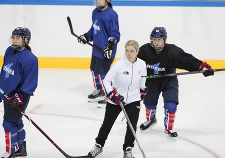 FILE PHOTO - Ice Hockey – Pyeongchang 2018 Winter Olympics – Women Training - Kwandong Hockey Centre, Gangneung, South Korea – February 11, 2018 - Korean team coach Sarah Murray skates with her players during practice. REUTERS/Kim Kyung-Hoon