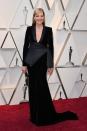 <p>The Oscar winner for “I, Tonya” wore a menswear inspired look with velvet detailing by Pamella Roland. <em>[Photo: Getty]</em> </p>