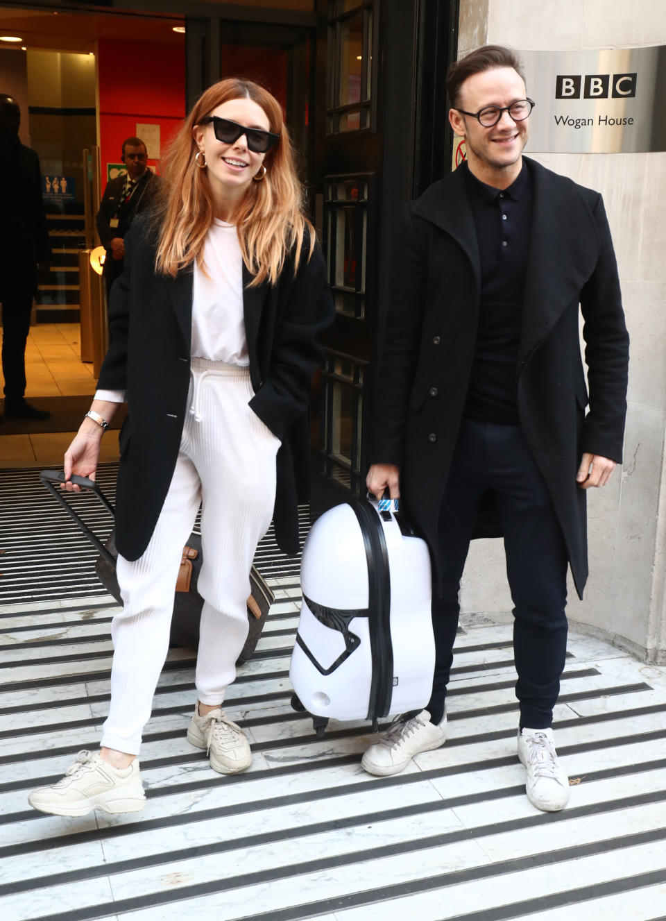 Strictly Come Dancing finalists Stacey Dooley and Kevin Clifton leave BBC Broadcasting House in London after appearing on the Chris Evans radio show.