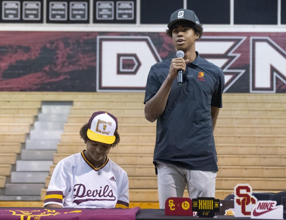 Red Mountain wide receivers Lenox Lawson and Ja'Kobi Lane sign their national letters of intent during National Signing Day at Red Mountain High's gym on Feb. 1, 2023, in Mesa. Lawson signed with ASU and Lane signed with USC.