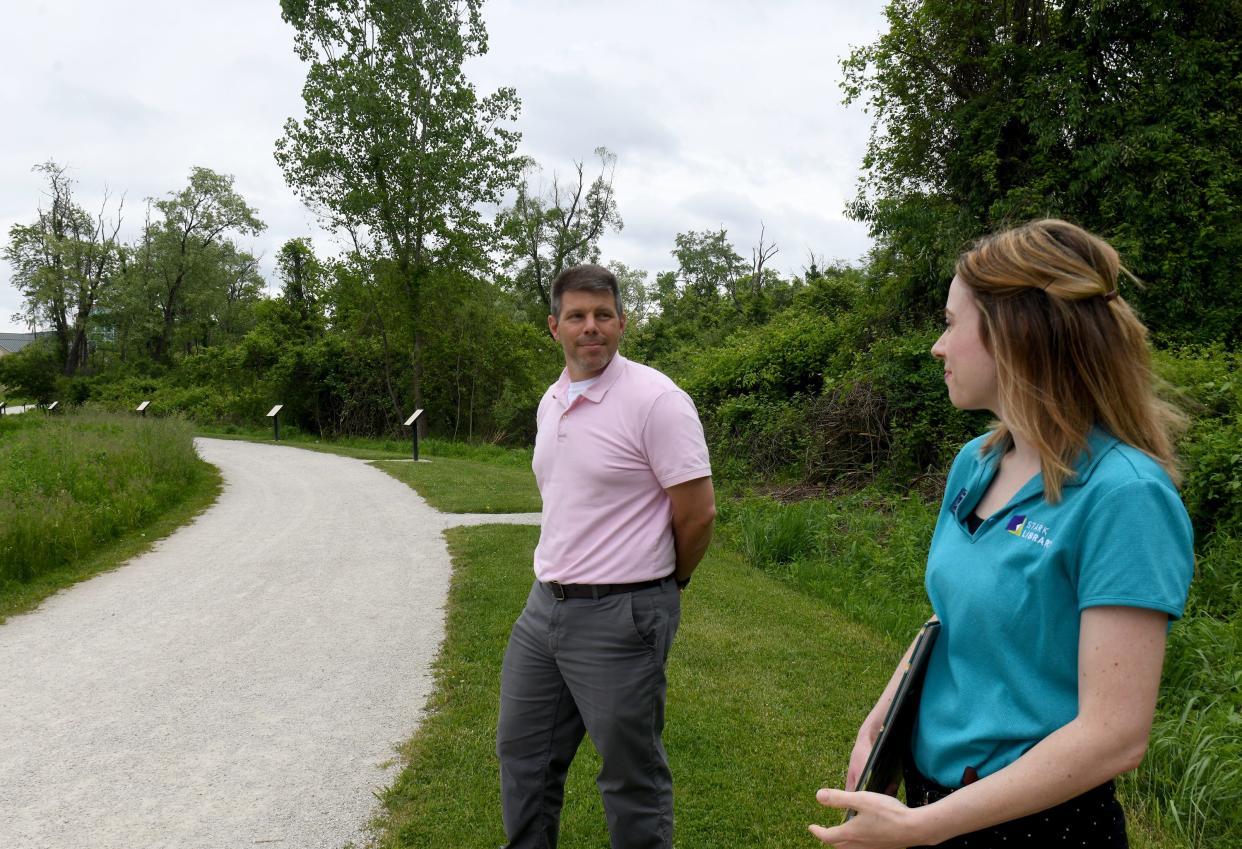 A permanent Trail Tales story walk will open Saturday at Stark Library's Perry Sippo Branch and Stark Parks' Exploration Gateway. Here Jared Shive with Stark Parks and June Kucalaba with Stark County District Library talk about the effort.