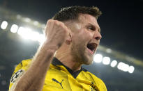 Dortmund's Niclas Fuellkrug celebrates his side's third goal during the Champions League quarterfinal second leg soccer match between Borussia Dortmund and Atletico Madrid at the Signal-Iduna Park in Dortmund, Germany, Tuesday, April 16, 2024(AP Photo/Martin Meissner)