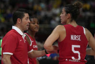 Canada's coach Víctor Lapena, left, talks with Kia Nurse during their bronze medal game against Australia at the women's Basketball World Cup in Sydney, Australia, Saturday, Oct. 1, 2022. (AP Photo/Rick Rycroft)