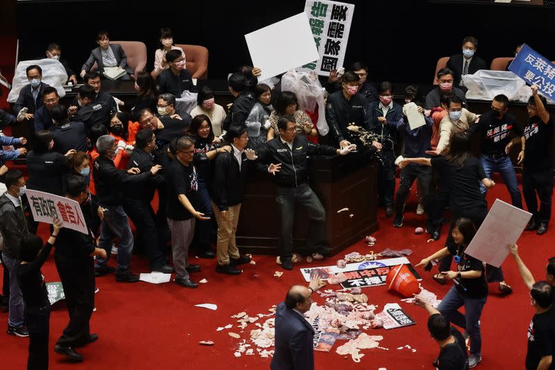 Pork intestines are seen during a scuffle in the parliament in Taipei