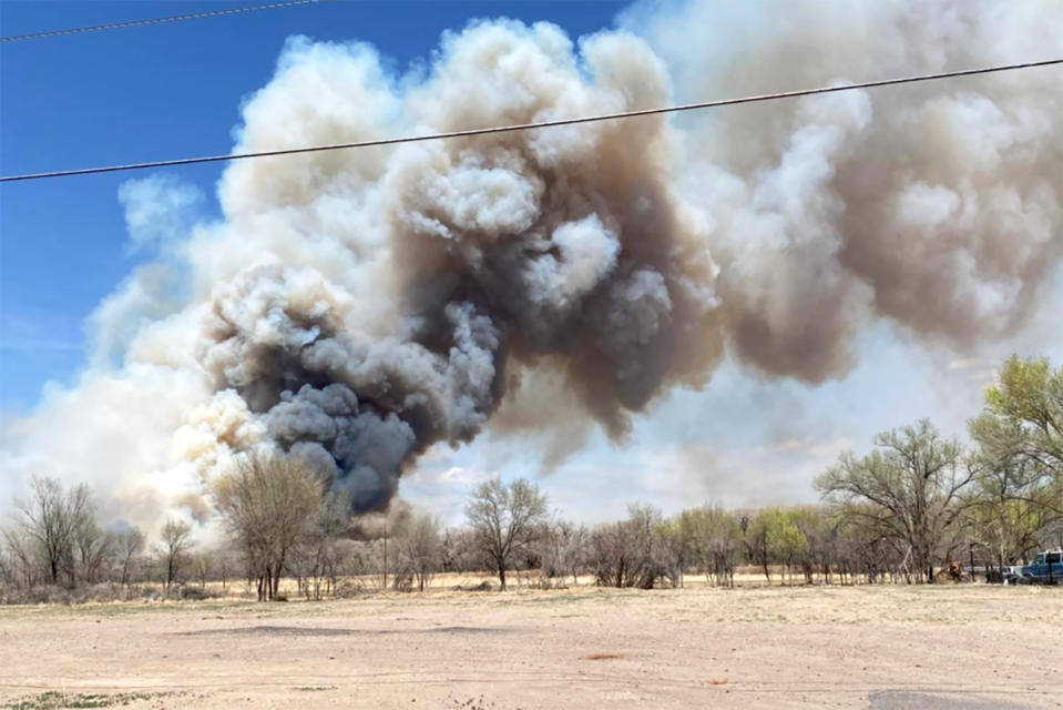 Smoke billows from a fire near the Bosque north of Rio Communities, in New Mexico, on April 11, 2022. (Valencia County Fire Department via Facebook)