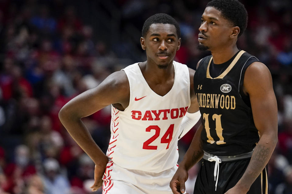 Dayton's Kobe Elvis (24) guards Lindenwood's Kevin Caldwell Jr. (11) during the first half of an NCAA college basketball game Monday, Nov. 7, 2022, in Dayton, Ohio. (AP Photo/Jeff Dean)