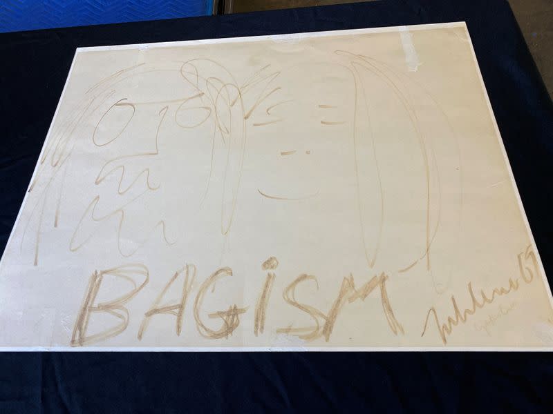 John Lennon and Yoko Ono's drawing of BAGISM, a term the couple created to satirize stereotyping, that was featured in their 1969 "Bed Peace" documentary, is displayed in a Julien's Auctions warehouse in Torrence, California