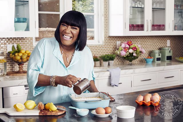 Bob Martus Patti Labelle, cooking in the kitchen.