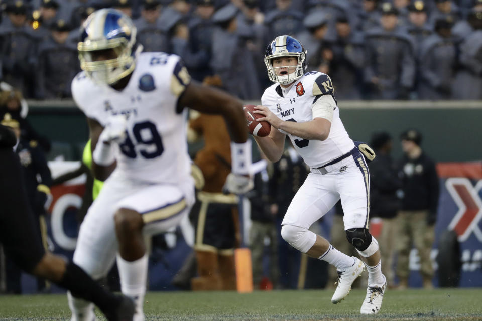 Navy's Zach Abey looks to pass during the first half of an NCAA college football game against Army, Saturday, Dec. 8, 2018, in Philadelphia. (AP Photo/Matt Slocum)