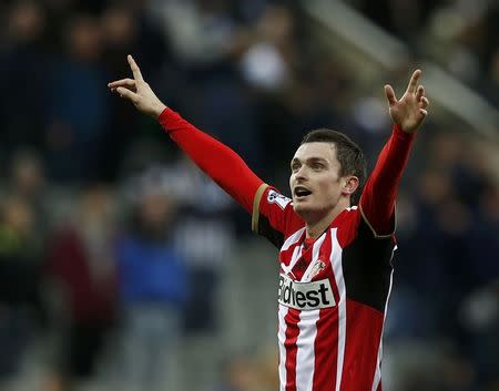 Sunderland's Adam Johnson celebrates after scoring a goal against Newcastle during their English Premier League soccer match at St James' Park in Newcastle, northern England December 21, 2014. REUTERS/Andrew Yates