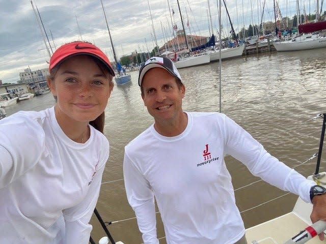 Merritt Sellers and her father, Scott Sellers, of Larkspur, Calif., head out to the starting line of the 2023 Bayview to Mackinac race on their J/111 sailboat nosurprise. They are seen here on the Black River in Port Huron on July 15. The Port Huron Yacht Club is in the background, where bagpipers serenade sailors as they head out to Lake Huron.