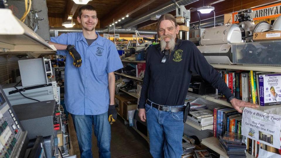 Reuseum employee Trevor Felgenhauer, left, and Program Director Glen Martin amid the Reuseum’s refurbished electronics. Sarah A. Miller/smiller@idahostatesman.com