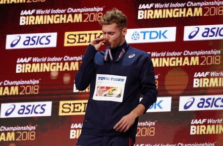 Athletics - IAAF World Indoor Championships 2018 - Arena Birmingham, Birmingham, Britain - March 3, 2018 France's Kevin Mayer poses with his gold medal during the Men's Heptathlon ceremony Action Images via Reuters/John Sibley