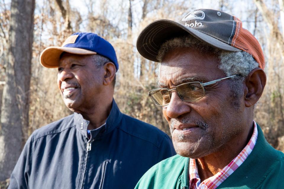 L.V. Jackson, a retired farmer, and his brother-in-law James Melvin Johnson Sr. pose for a portrait on a part of Johnson’s 40 acres of farmland in Jackson, Tenn., on Wednesday, Dec. 6, 2023. The land is currently empty but in season Johnson will grow soybeans. The men are applying for a piece of a $2.2 billion USDA Discrimination Financial Assistance Program, which aims to provide financial assistance to farmers, ranchers and forest landowners who experienced discrimination in USDA farm lending programs prior to 2021.