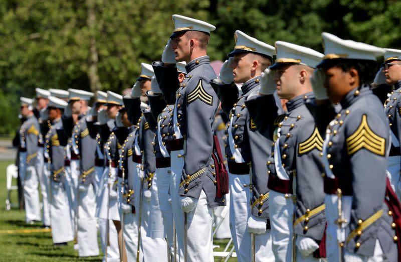 West Point graduating cadets salute during 2020 United States Military Academy graduation ceremony at West Point, New York