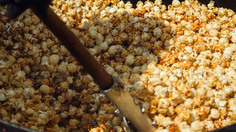 Person cooking kettle corn