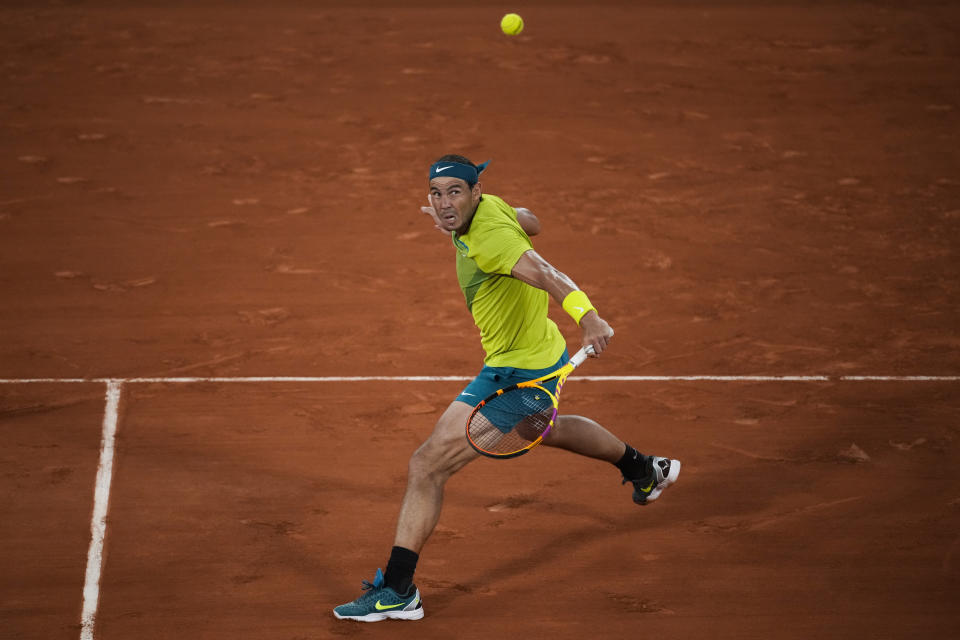 Spain's Rafael Nadal plays a shot against Germany's Alexander Zverev during their semifinal match at the French Open tennis tournament in Roland Garros stadium in Paris, France, Friday, June 3, 2022. (AP Photo/Christophe Ena)