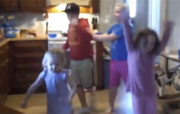 Girl pushes boy for more 'Nae Nae' dance space.