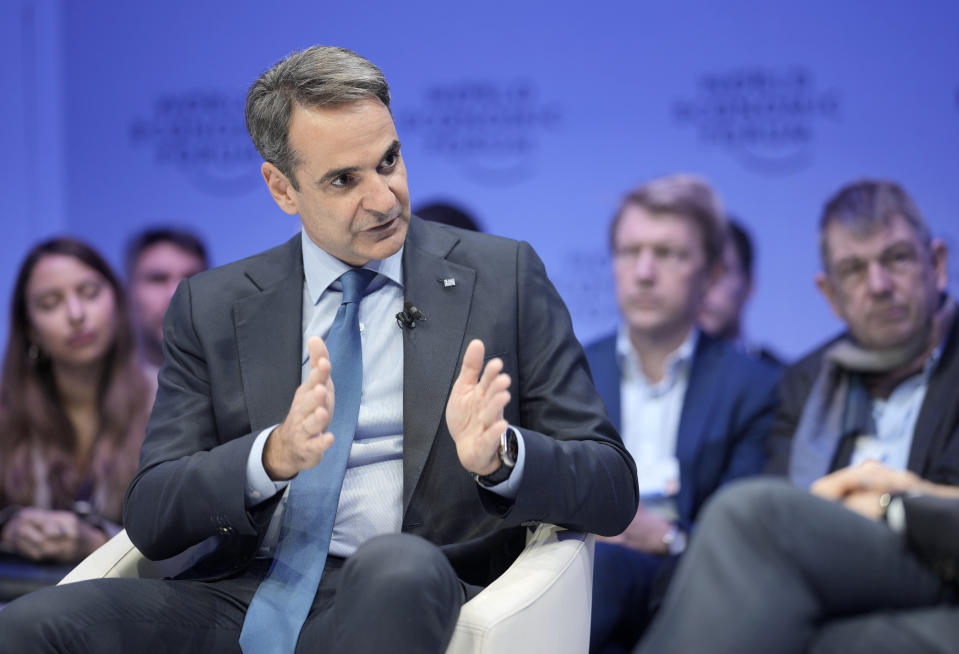 Kyriakos Mitsotakis, Prime Minister of Greece, speaks at the World Economic Forum in Davos, Switzerland Thursday, Jan. 19, 2023. The annual meeting of the World Economic Forum is taking place in Davos from Jan. 16 until Jan. 20, 2023. (AP Photo/Markus Schreiber)