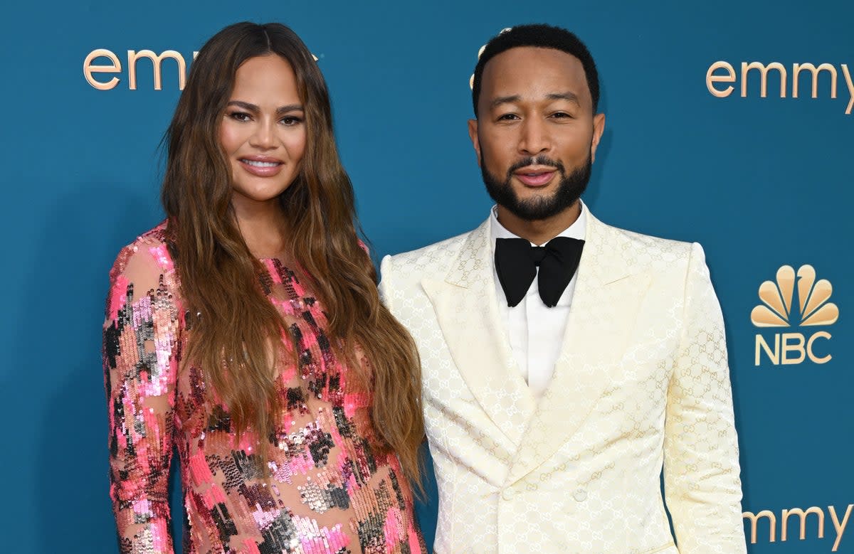 John Legend says he’s fine with pregnant Chrissy Teigen’s plans to extend their family even further  (AFP via Getty Images)