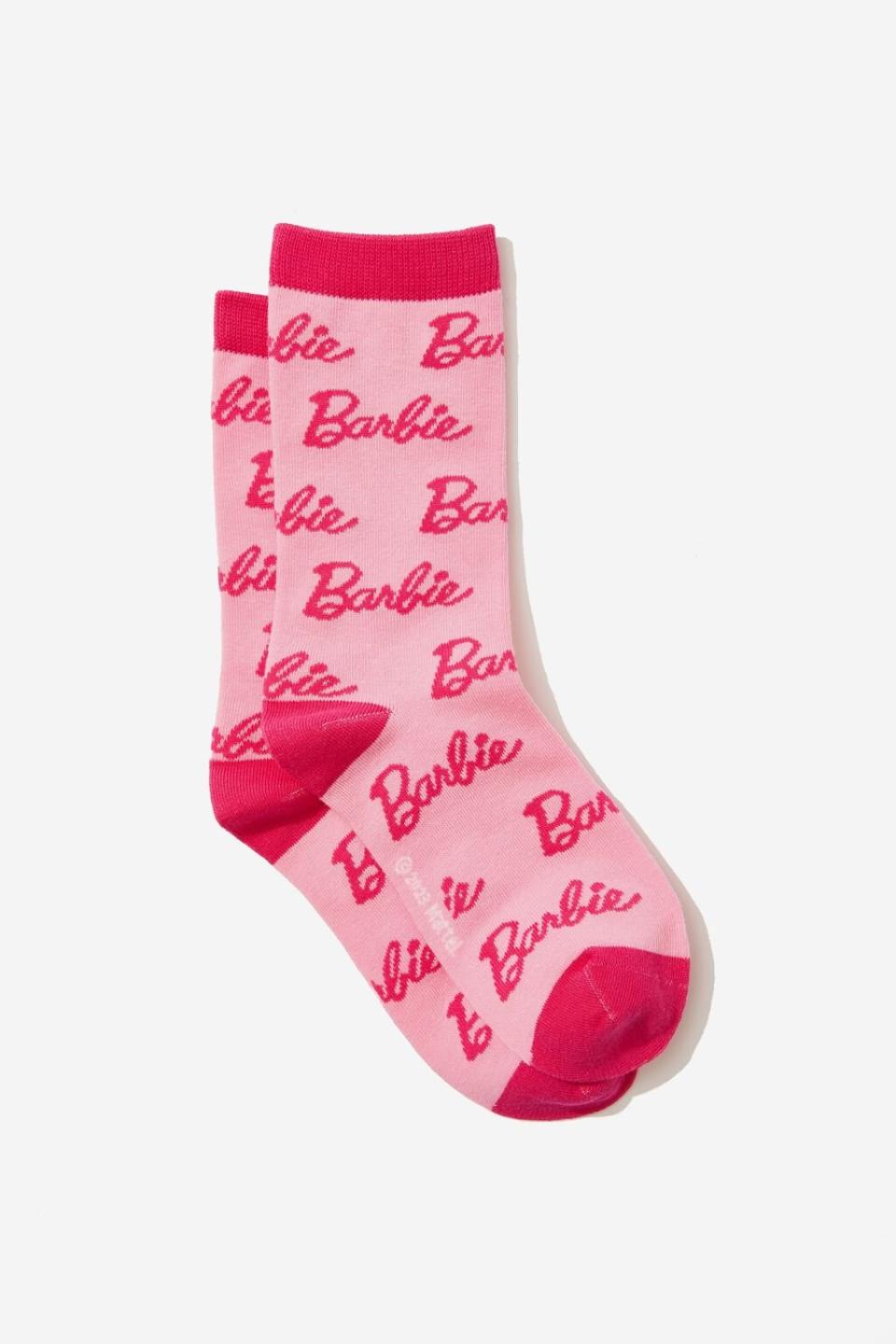 pink and hot pink socks that say Barbie