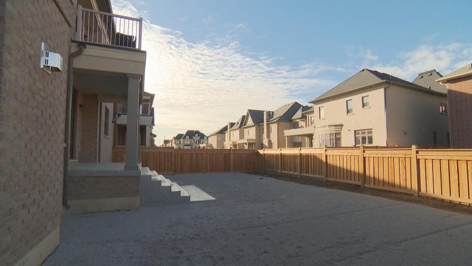 In addition to work in the front and side of his home, Polyviou hired Freedom Pools to lay interlocked patio stones, install a set of concrete stairs and build a wooden canopy in the backyard.