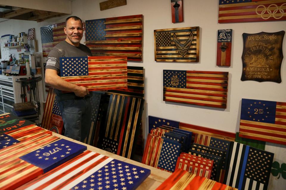 Seabrook local Steve Rita has made hundreds of hand-carved American flags from wood.
