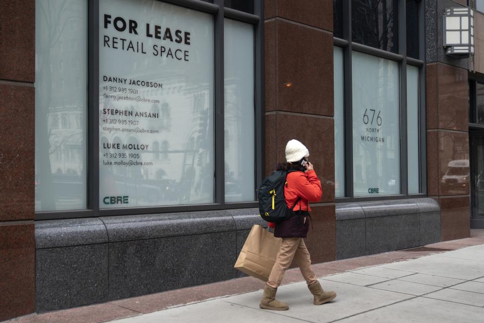 Retail space is vacant along Michigan Avenue Thursday, March 23, 2023, in Chicago. Along the iconic shopping and tourist strip known as the Magnificent Mile, storefronts sit vacant, casualties of the pandemic, crime and retail trends that were moving away from in-person shopping even before COVID-19. (AP Photo Erin Hooley)