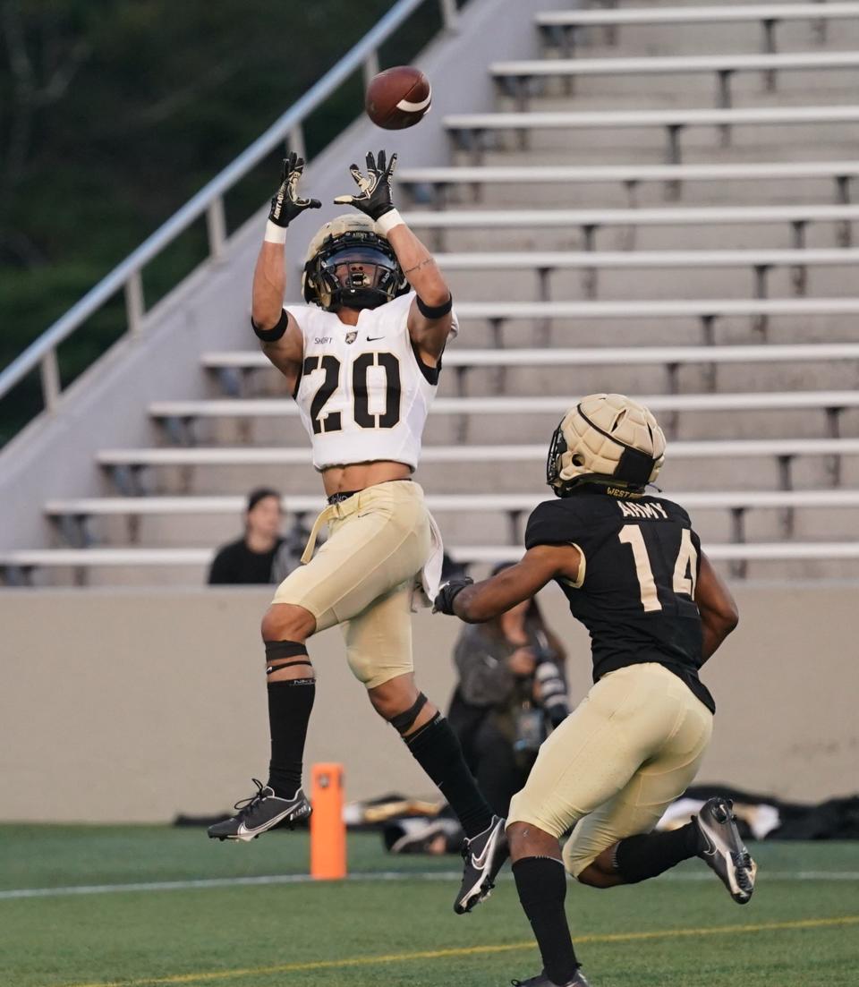 Army West Point running back Noah Short (20) pulls in a pass for a touchdown during a spring scrimmage at Michie Stadium on the campus of the USMA at West Point in West Point on Friday.