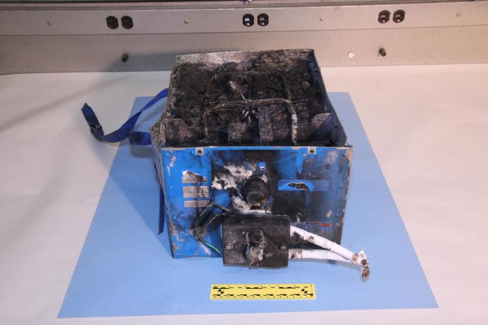 This undated image provided by the National Transportation Safety Board shows the burned auxiliary power unit battery from a JAL Boeing 787 that caught fire on Jan. 7, 2013, at Boston's Logan International Airport. Federal officials said on Wednesday, Jan. 16, 2013, that they are temporarily grounding Boeing's 787 Dreamliners until the risk of possible battery fires is addressed. (AP Photo/National Transportation Safety Board)