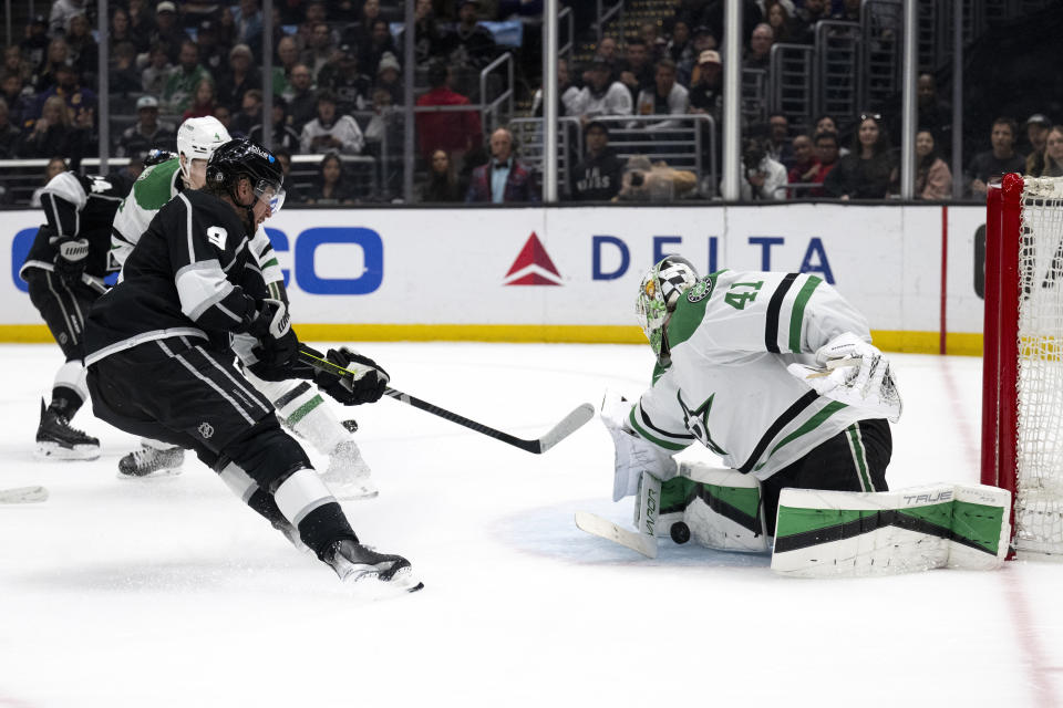 Dallas Stars goaltender Scott Wedgewood (41) blocks the shot by Los Angeles Kings right wing Adrian Kempe (9) during the second period of an NHL hockey game, Saturday, March 9, 2024, in Los Angeles. (AP Photo/Kyusung Gong)